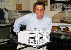Nazareth Berberian with the miniature of Hotel Aragats